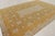 This oversized 10x14 Scandinavian rug presents a sophisticated geometric composition in wool and sari silk. A warm golden...