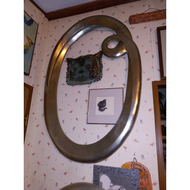 A pair of beautiful huge and quite heavy wooden frames painted silver. One has a solid wooden back and the other is an...