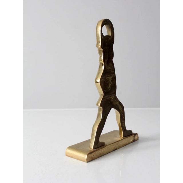 This is a vintage Virginia Metalcrafters brass doorstop circa 1960s. Shaped as a Colonial Williamsburg Hessian soldier,...