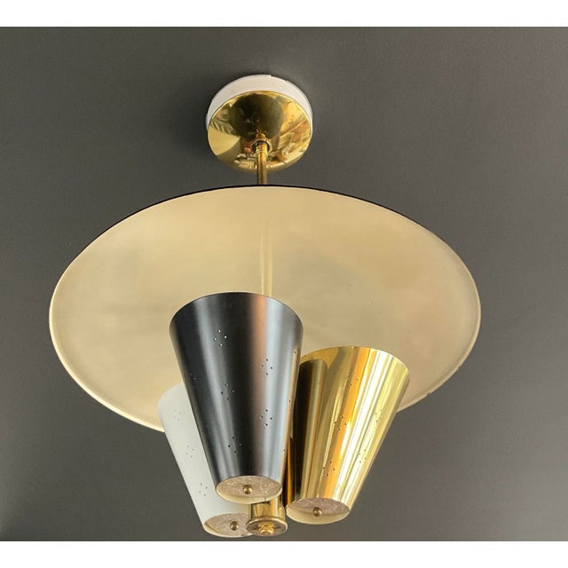 Vintage 1950's Mid Century Modern perforated triple cone reflector fixture with hang-straight swivel canopy. 18" diameter,...