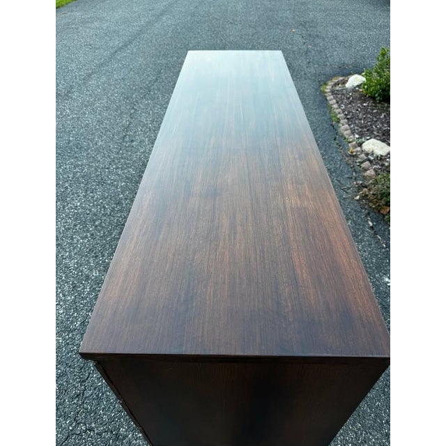 Bring timeless American craftsmanship into your home with this striking **Mid-Century Modern 6-drawer lowboy dresser** by...