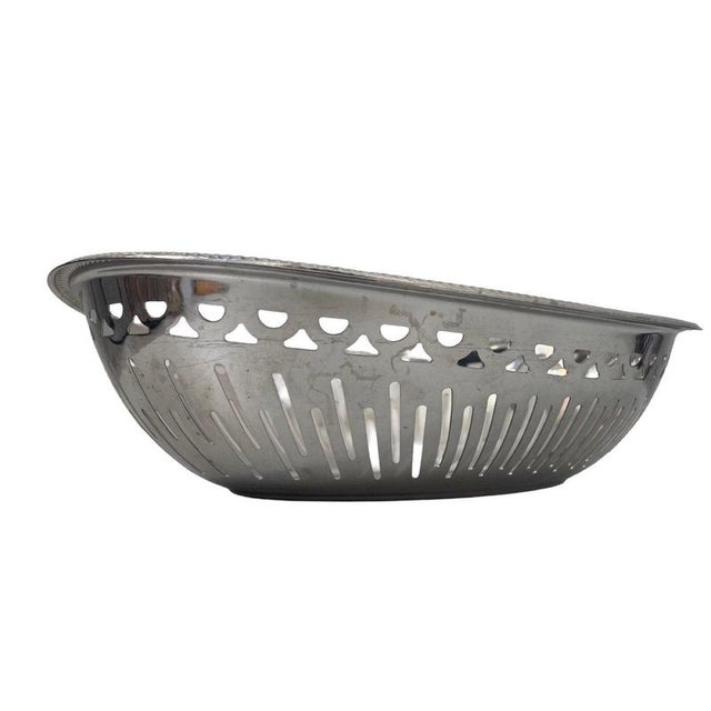 Oval shaped bowl often used as a bread basket, bonbon plate or fruit bowl. Made from high quality stainless steel. In good...
