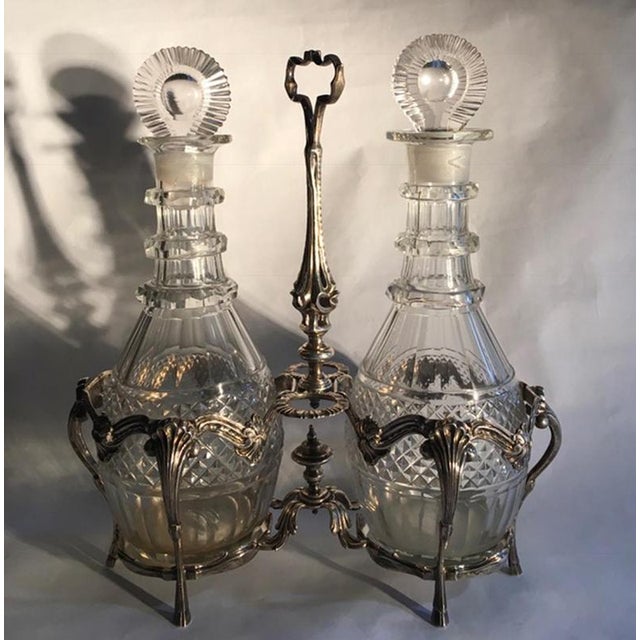 England Mid -18th century circa sterling silver and cut glass cruets service set in George IV style The sterling silver...