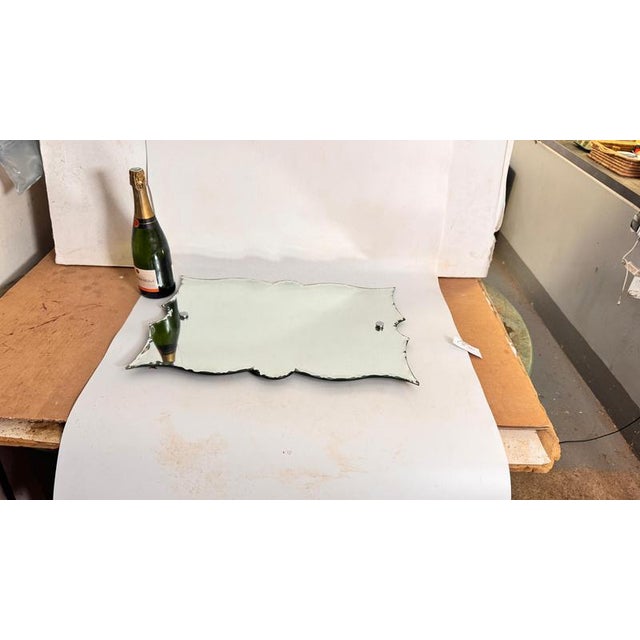 Art Deco Frameless Mirror with Sculpted Edges — France, 1940s : This is a refined Art Deco mirror, manufactured in France...