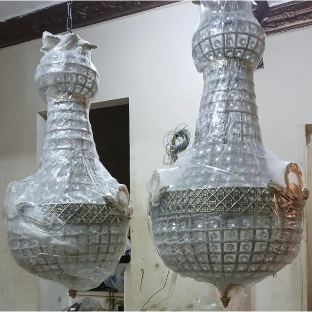 Up for consideration is a beautiful vintage crystal and gold bow and garland chandelier. This would look lovely in your...