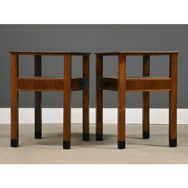 A rare pair of single drawer walnut nightstands designed by Edward Wormley for Dunbar. Circa 1950’s. Made in USA....