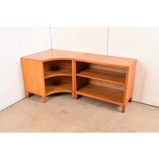 A rare and exceptional Mid-Century Modern solid birch two-piece corner bookcase By Leslie Diamond for Conant Ball USA,...