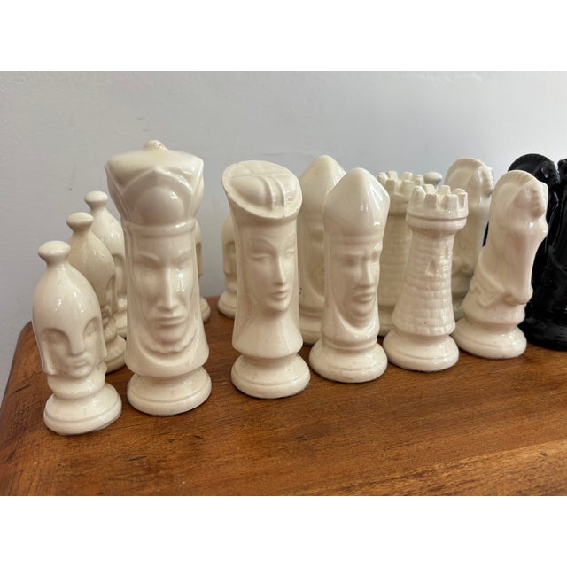 1960s medieval style Duncan complete set of chess pieces in high gloss black and white. Please see condition details...