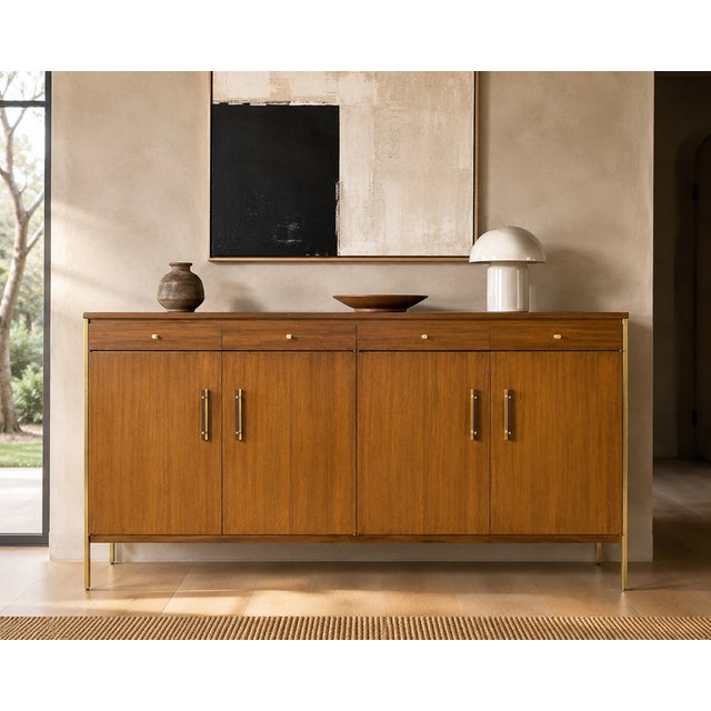 Designed by Paul McCobb for The Calvin Group, this ribbon mahogany credenza dates to approximately 1965 and exemplifies...