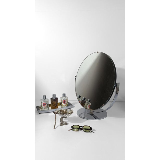 Vintage table mirror made in Italy around the 70s. Coming from a shop of eyeglasses and sunglasses in Rome, now closed, it...