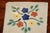 A beautiful set of 9 hand-painted, terra cotta tiles from Mexico. There are 5 tiles that are 4"x4" and 4 tiles that are...