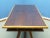 Very nice conference or dining table made of solid wood. Table top was equipped with a smoked glass plate. The table frame...