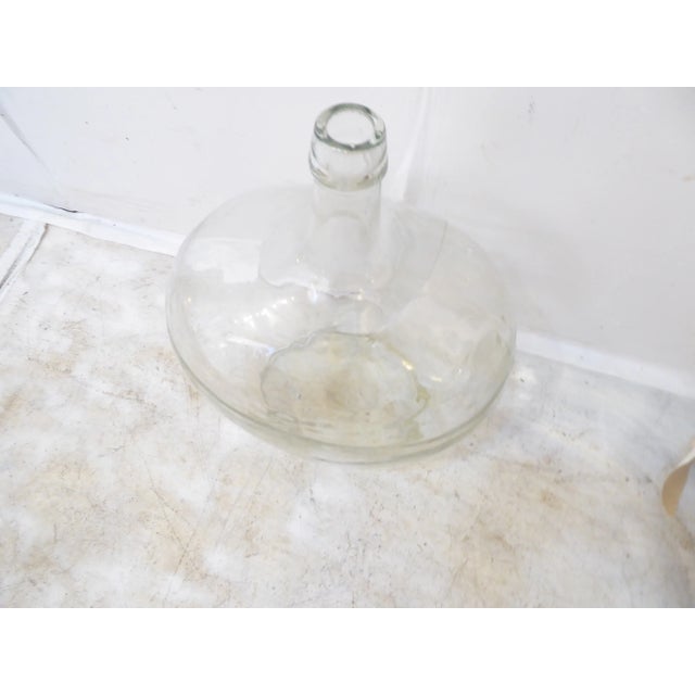 This heavy weight wine bottle has an swirled glass.