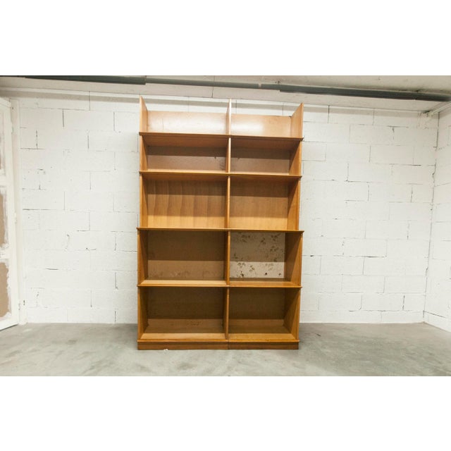 Oscar display bookcase by Didier Rozaffy, 1952. This bookcase is sturdy but has some minor wear consistent with its use...