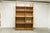 Oscar display bookcase by Didier Rozaffy, 1952. This bookcase is sturdy but has some minor wear consistent with its use...