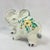 Cute vintage Italian ceramic elephant with a hand painted floral design. This cute Mid-Century elephant is a good luck...