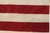 A handwoven wool flatweave with a stars-and-stripes flag design, made in China and measuring 5' x 8'. With no pile, the...