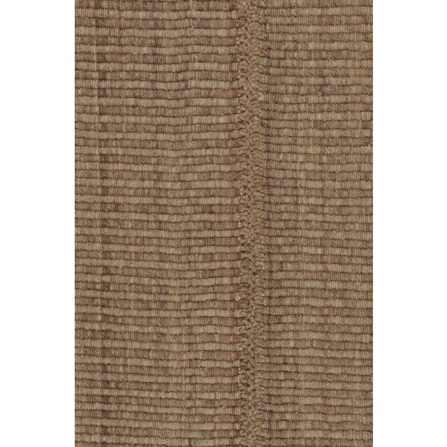 Handwoven in wool, this 9x12 Rez Kilim features softly striated taupe bands that create movement through texture rather...