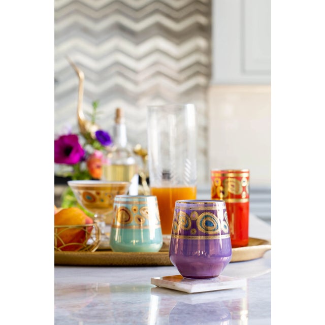 Ornate emblems and decorations that are indicative of royalty inspired this unique drinkware collection. The Regalia...