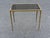 Elegant Mid-Century Modern Brass Side Table with Smoked Glass, 1960s An elegant Mid-Century Modern side table featuring a...