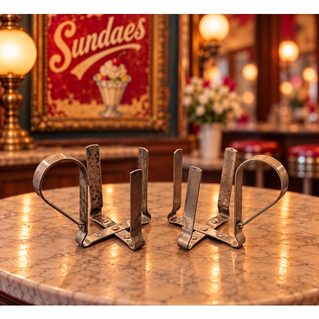 Bring a little old-fashioned soda fountain nostalgia to your collection with this pair of vintage metal paper sundae cup...