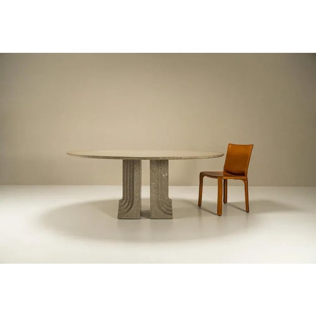 This Italian dining table from the 1970s exudes timeless elegance and beauty. It was designed by perhaps one of the...