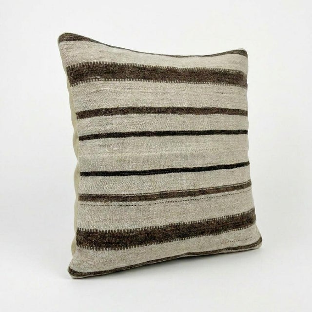 This beautiful 24'' x 24'' Turkish Kilim pillow cover was made from authentic handwoven flatweave kilim. The traditional...