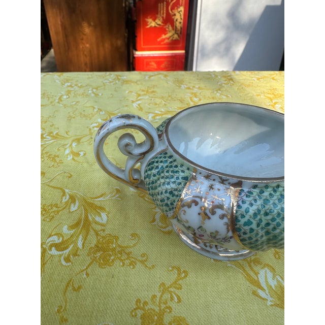 Up for consideration is a beautiful small Italian ceramic creamer cup with a pouring spout. This would look lovely in your...