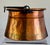 A copper cauldron with wrought iron handle. Hand crafted to endure years of use. French from the 19th century.