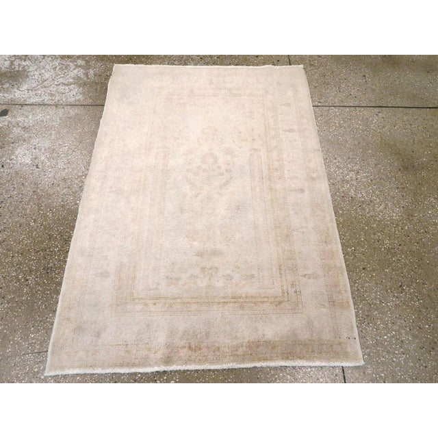 This mid-20th century Turkish Sivas rug, showcases the refined elegance and subtle palette typical of Sivas workshop...