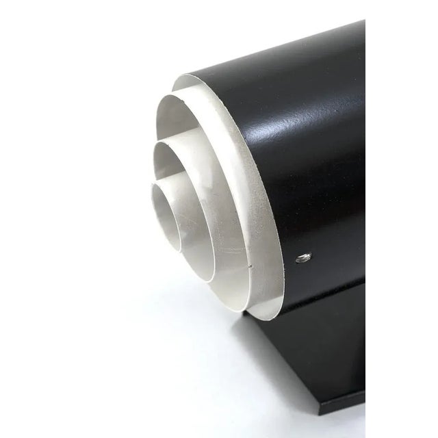 Wonderful wall sconce by jackfluor for noralux/seidenberg frères 1957. The lamp is made from black/white metal. Has some...