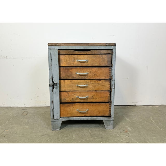 This vintage Industrial iron chest of drawers was made in former Czechoslovakia during the 1960s. It features an iron...