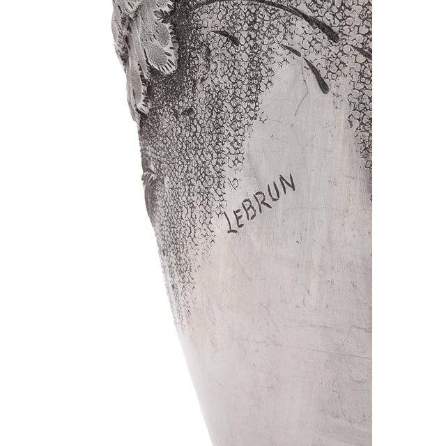 Pewter vase. Embossed flower decorations. Art Nouveau Signed Lebrun Circa 1900 This piece has an attribution mark, I am...