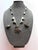 A highly sculptural sterling silver jewelry suite consisting of a necklace with bird pendent and a matching pair of...