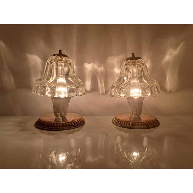 Pair of vintage mid-century Murano glass and metal lampshades, attributed to Ercole Barovier and dating back to the...