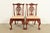An outstanding pair of Chippendale or Georgian style side chairs or dining chairs By Baker Furniture USA, Circa 1980s...