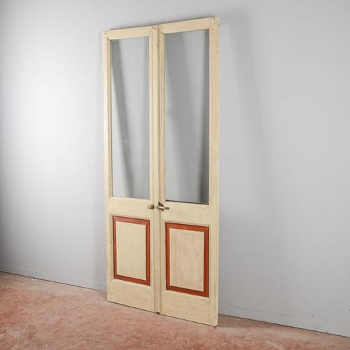 This elegant double-panel glass door represents a refined example of period craftsmanship, ideal for those seeking to...
