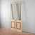 This elegant double-panel glass door represents a refined example of period craftsmanship, ideal for those seeking to...