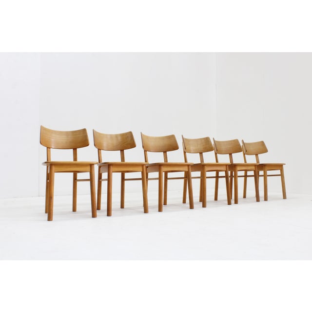 Vintage Danish solid wood dining chairs designed in the 1960s, Denmark. Organic design with curved backs. These mid-...
