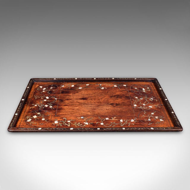This is an antique Colonial serving tray. An Anglo-Indian inlaid teak afternoon tea slide, dating to the High Victorian...