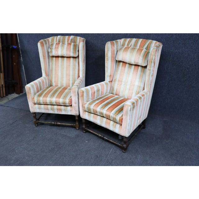 Ethan Allen velvet striped wingback chairs with oak carved legs.