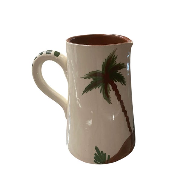 Direct from the vibrant souks of Marrakech, this recently handcrafted terracotta pitcher captures the sun-drenched spirit...