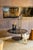 Rigel is a low coffee table made in Italy that combines marble, lacquered wood, and steel in a harmonious composition. The...