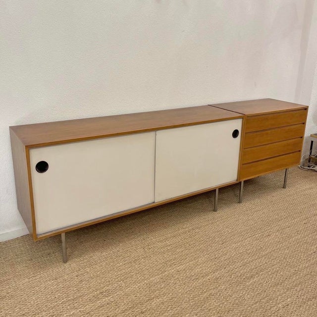 Large two-part walnut sideboard by Swiss designer Kurt Thut, produced in Switzerland around 1950. One large section, 160...