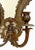 Pair of antique early 20th century bronze wall sconces. Features intricate, ornate detailing characteristic of 18th and...