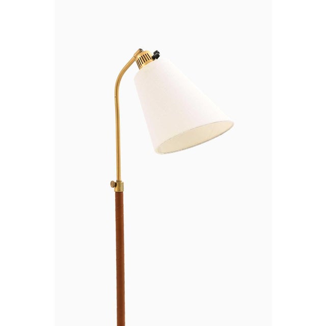 This rare height-adjustable floor lamp, model 545, designed by hans bergström and produced by ateljé lyktan in åhus,...