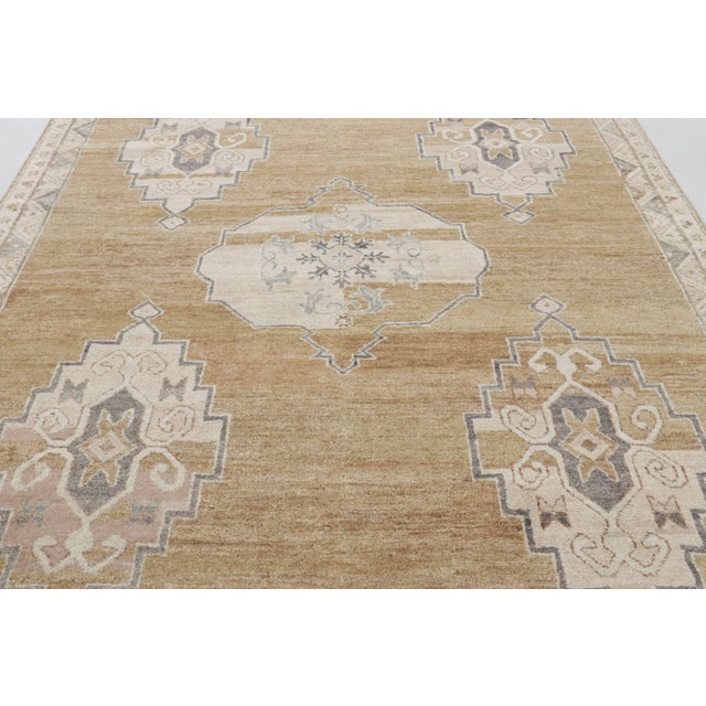 This magnificent 8x10 rug from Rug & Kilim Modern Classics Collection is a luminous, tribal work of art, hand-knotted...