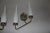 This pair of minimalist sconces dates to the 1950s. Up to 250V (Europe/UK Standard).The wiring of this item may be...
