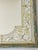 Mid 20 th c reverse painted glass mirror in blue and gold.