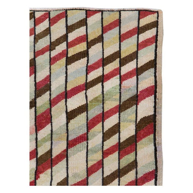 A vintage Turkish Anatolian accent rug handmade during the mid-20th century. Measures: 3' 8" x 7' 7"